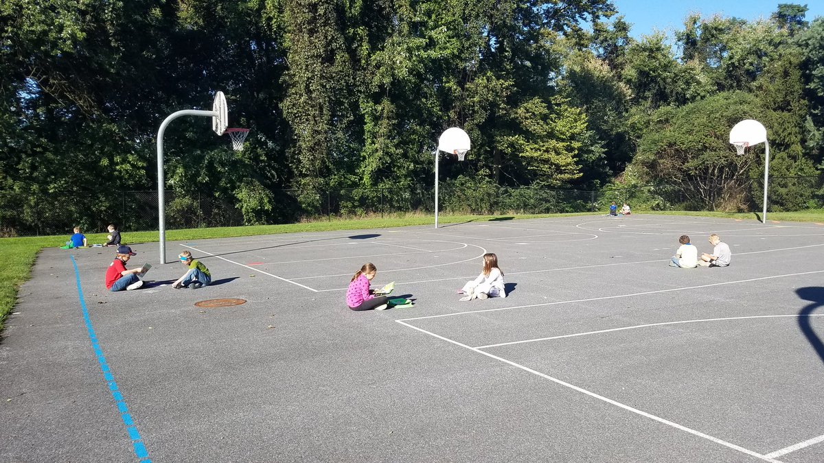 Beautiful fall morning to sharpen the saw by reading together outside!