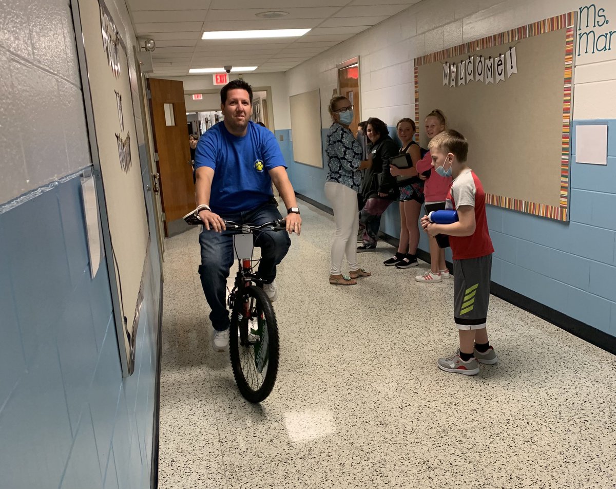 DrBallatore's tweet photo. You never know what you are going to see in the halls of Lakewood Elementary School! 🏫 🚴 @RReyes014 is patrolling the hallways on his bicycle today!
#ourLKEStory
#hcslead
@LKEBobcats
@kroberts001
@RReyes014
@AimeeMcElveen
@kristy_crick
@agordon719 https://t.co/bSEJeFUL6c