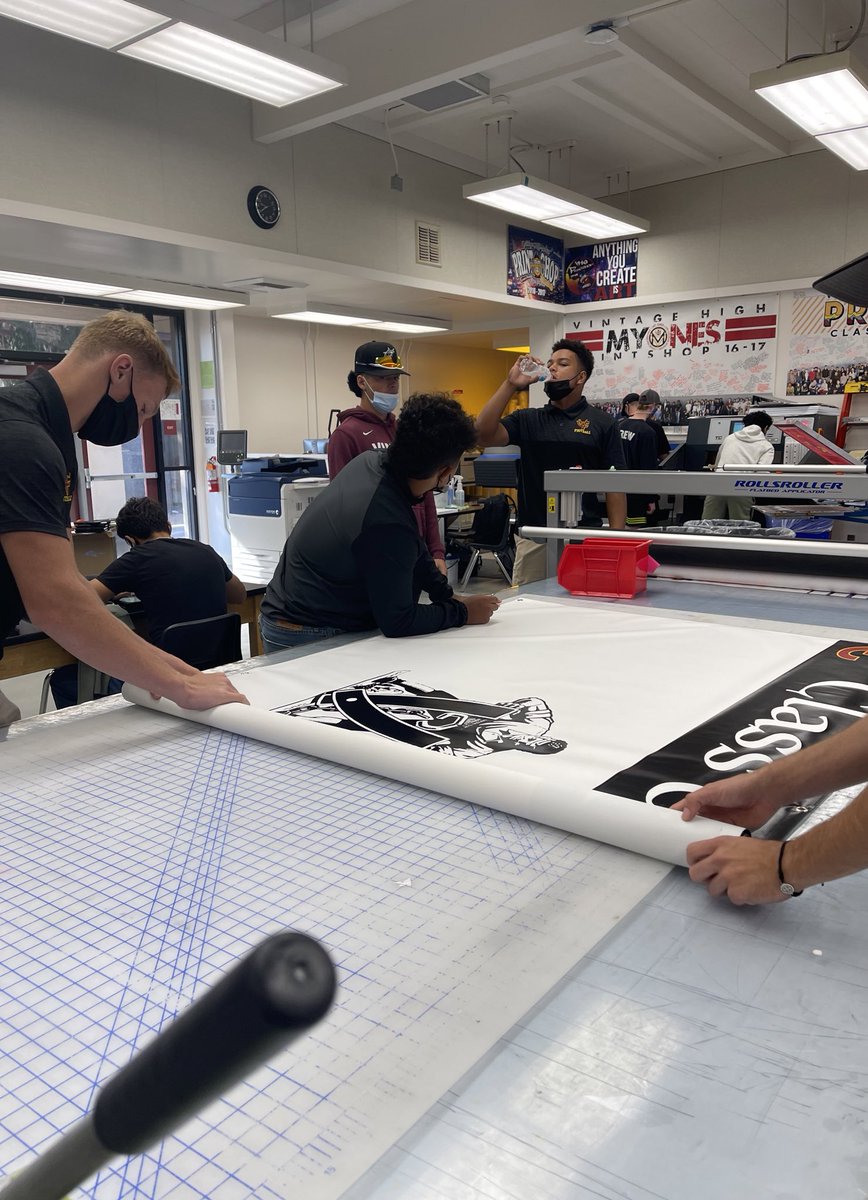 Tomorrow is Drake’s half birthday! 🎊 They are working on the 2022 banner!! #2KDay #ClassOf2022 #vhsprintshop #vintagehigh