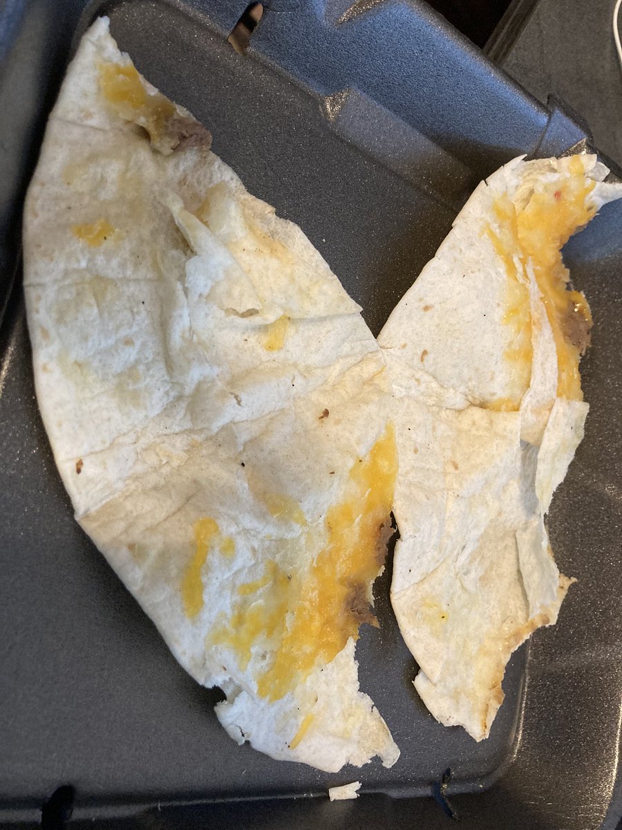 TysonAmandaj's tweet photo. @TijuanaFlats I ordered a quesadilla from Tijuana Flats and received a mostly dry tortilla with a sprinkle of cheese and barely any meat or other toppings. 🤷🏼‍♀️🤷🏼‍♀️ still hungry in florida!!!!! What the heck is this??? https://t.co/MkVuvcNysK