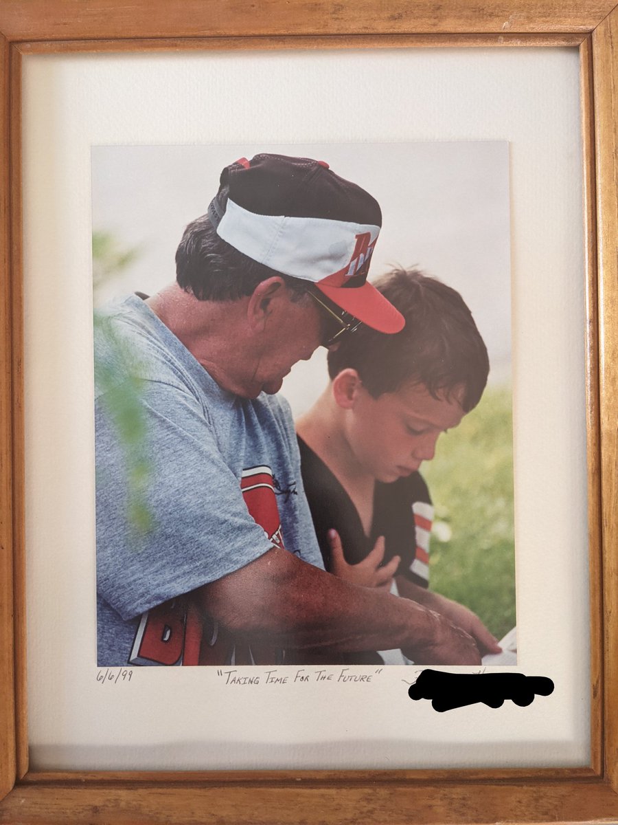 @BrownsBackers Twitter, I need your help. In 1999, at an event @hiramcollege that celebrated the legacy of the Cleveland @Browns, I snapped this photo of a Grandfather & Grandson sitting together under a tree sharing a moment as only they could! I want that 'kid' to have it. 1/2