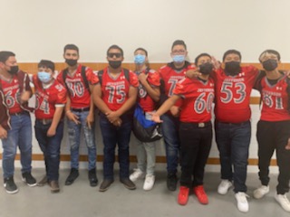 Watching Jefferson play Burgess and sporting Jefferson football jerseys, courtesy of Coach Martinez.  Thank you Coach!