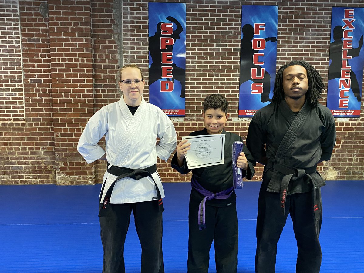 MsFagin's tweet photo. Onwards towards being a Black Belt in karate 🥋! Graduation was this afternoon, &amp; my son received his purple belt. At every graduation they set goals. His: better grades &amp; get in Program Challenge, Blue Belt by Christmas, and chores done every day. #KarateMom #BoyMom #ProudMom https://t.co/a9JIINO5bC