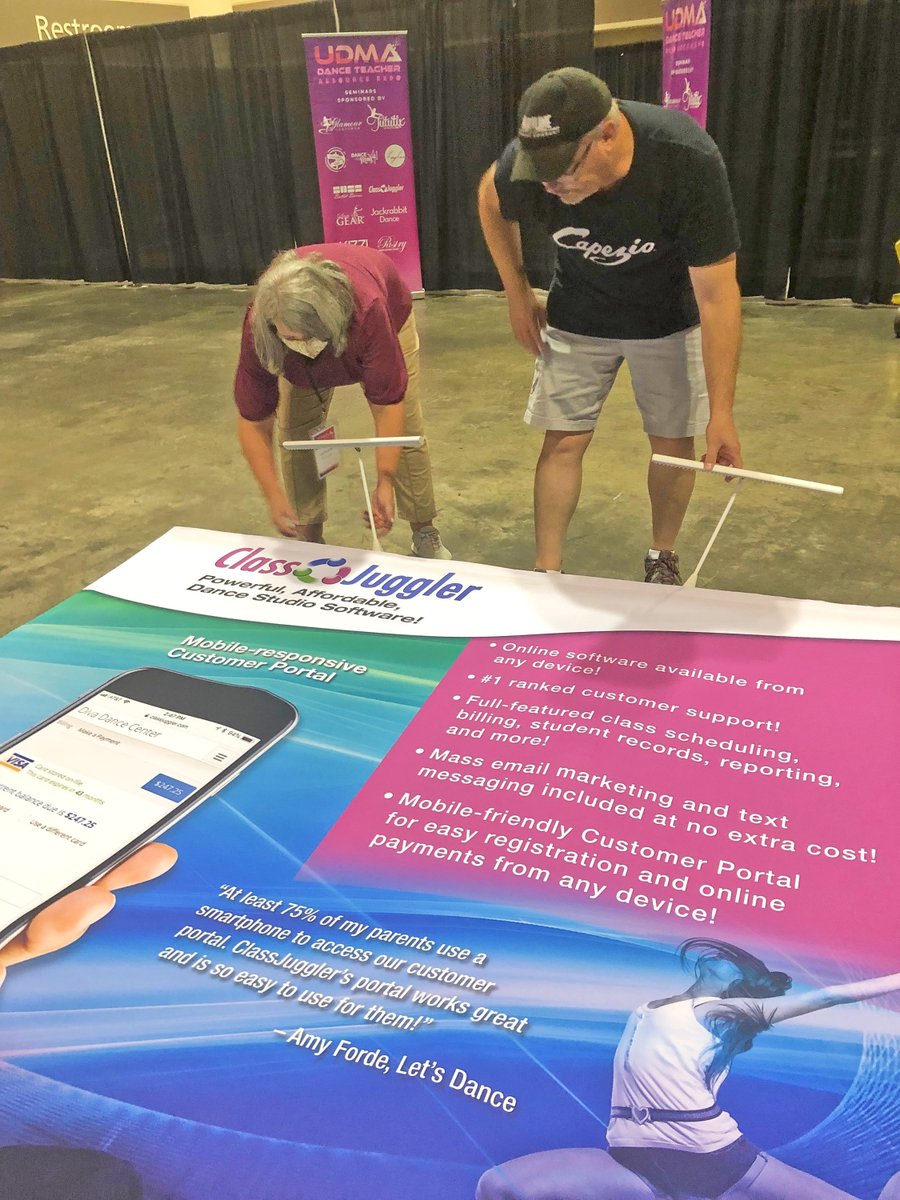 ClassJuggler's tweet photo. ClassJuggler's Lori & Jon team up to set up the booth for the big #UDMA Orlando event. Plan to be there? Don't be shy: Drop by, say Hi! We enjoy meeting customers! :-) https://t.co/A5ZKPtvNpK