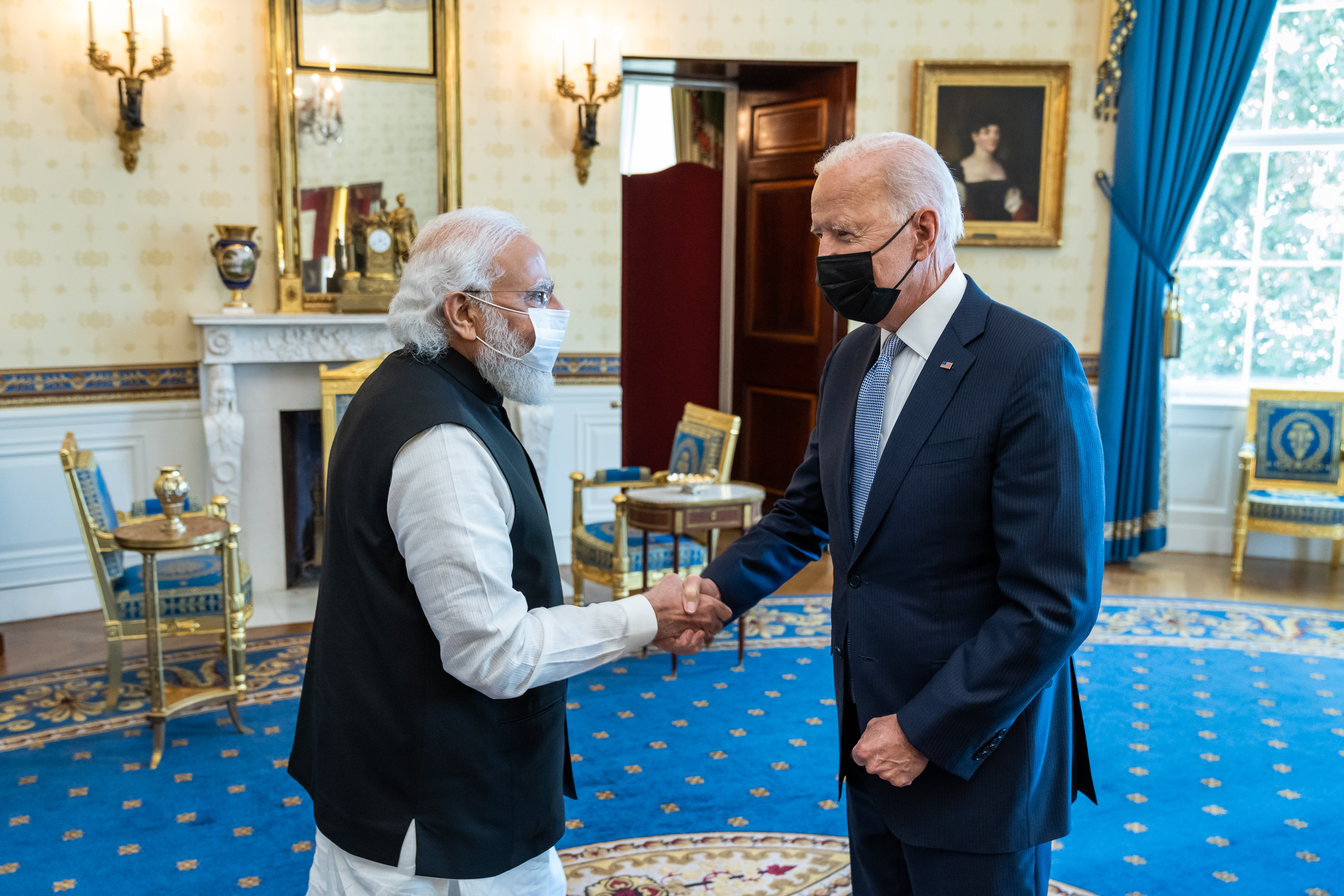 President Biden shakes hands with Prime Minister Modi