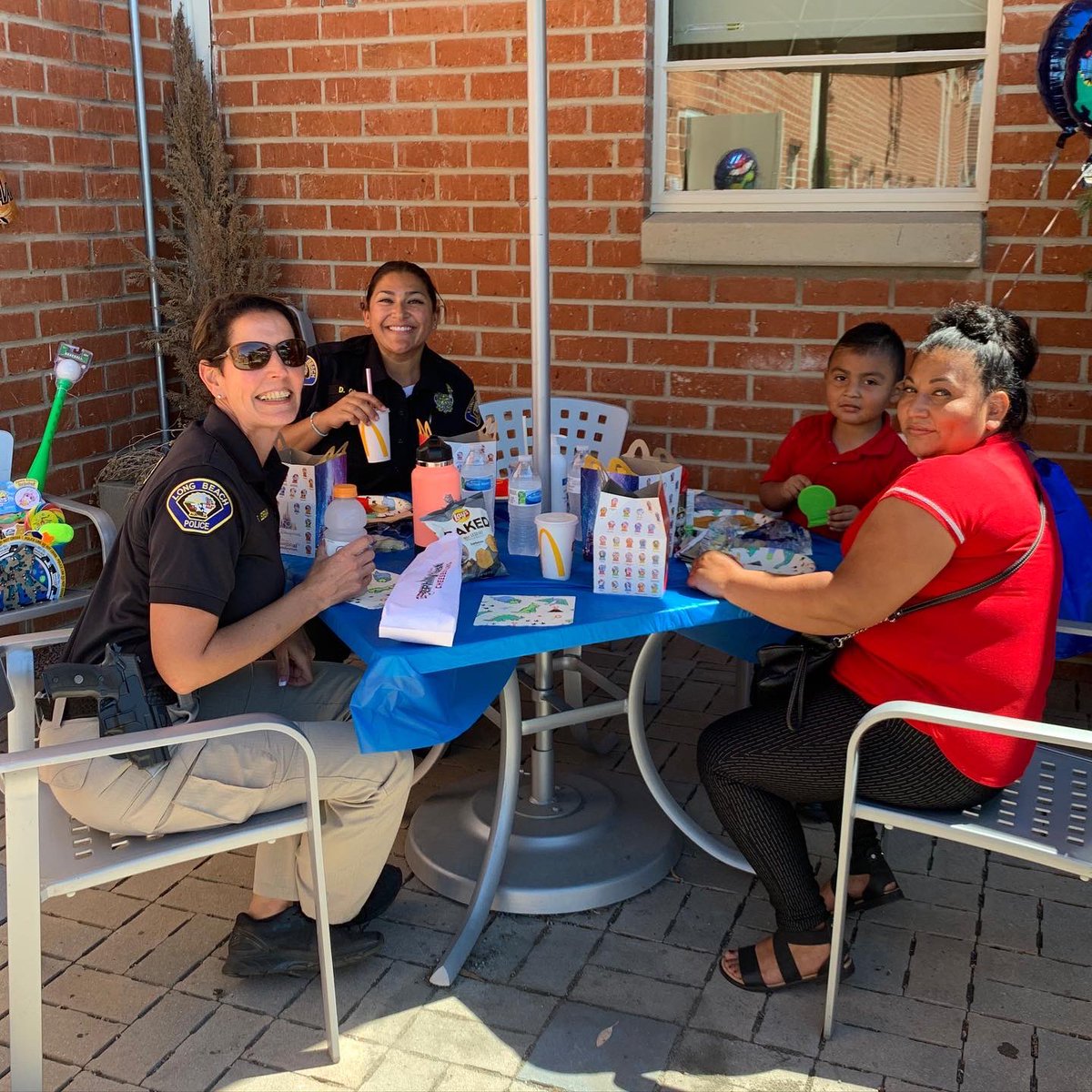 LBPD's tweet photo. Building trust in our community everyday💙

Alex a 4yr old of west side LB was hesitant when he saw officers a few weeks ago. Yesterday, he was invited to our station to play w/ #K9 Kala &amp; enjoy a happy meal w/ officers. Thx to Ofc. Green for making this possible! 🍟🐕 #LBPDCares https://t.co/YfqeXkbQaZ