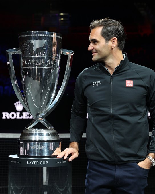 Roger Federer poses for a photograph with the Laver Cup Trophy after taking part in a live TV interview on CNBC at TD Garden on September 24, 2021 in Boston, Massachusetts.
