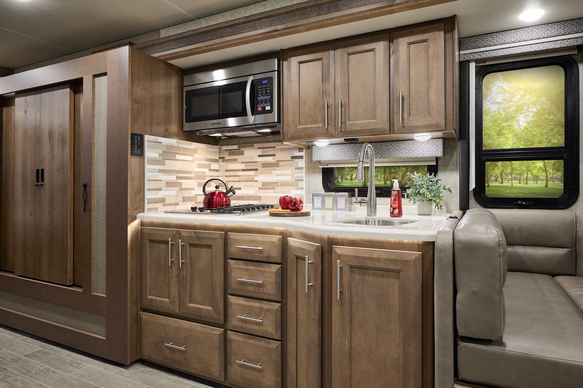 ThorMotorCoach's tweet photo. Could you see your family camping in this #ClassARV? Miramar's 34.6 floor plan features bunk beds, stackable washer/dryer prep, a king-sized bed and a large wardrobe 🙌 Learn more about the family-friendly features offered on this floor plan: https://t.co/kFXzDOVt4s https://t.co/MtshIgEfwq