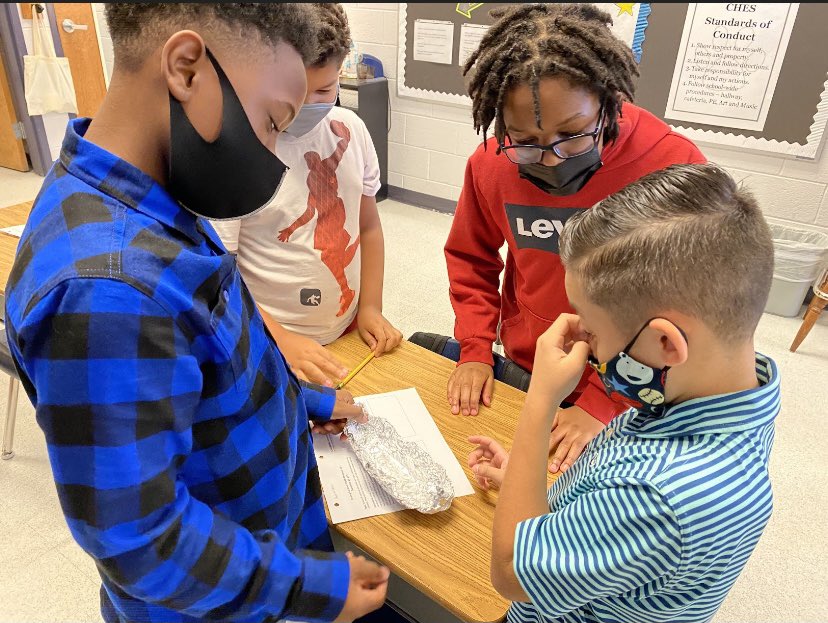 TeachLoveDaily's tweet photo. STEAM Challenge 1: Floating Foil Boats. We put our critical thinking skills into action!  We had to think about the impact of weight on the buoyancy of boats as we designed a boat to hold the most glass marbles! Winners announced on Monday! https://t.co/lDXJ41RSkY