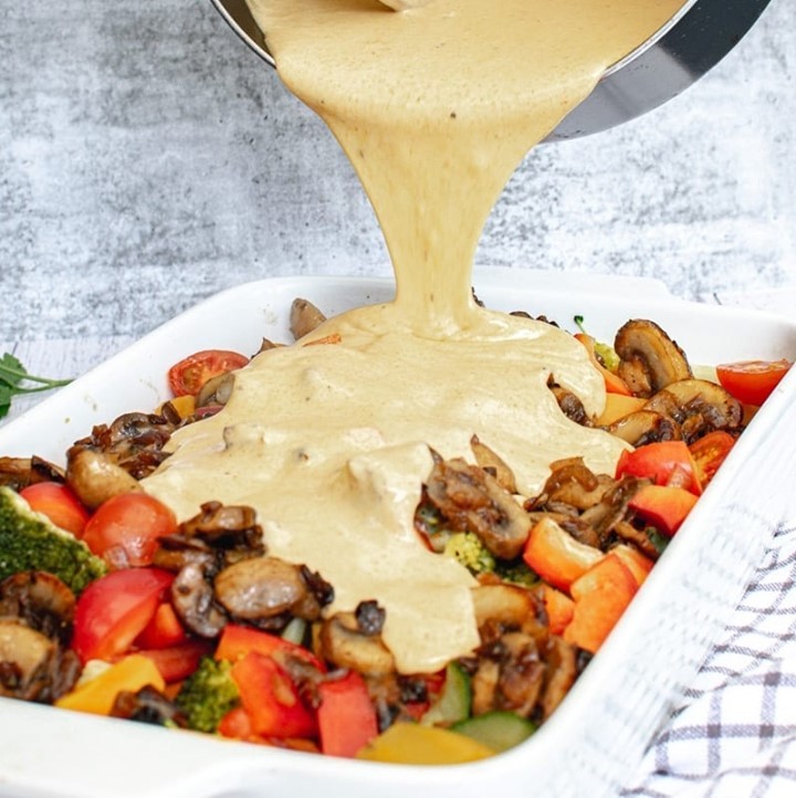 Everyone will eat their veggies when they're msothered in this rich and creamy vegan "cheese" sauce. Yummy! #vegetarian #vegan⁠
⁠
Recipe >>>vegkitchen.com/roasted-veggie…