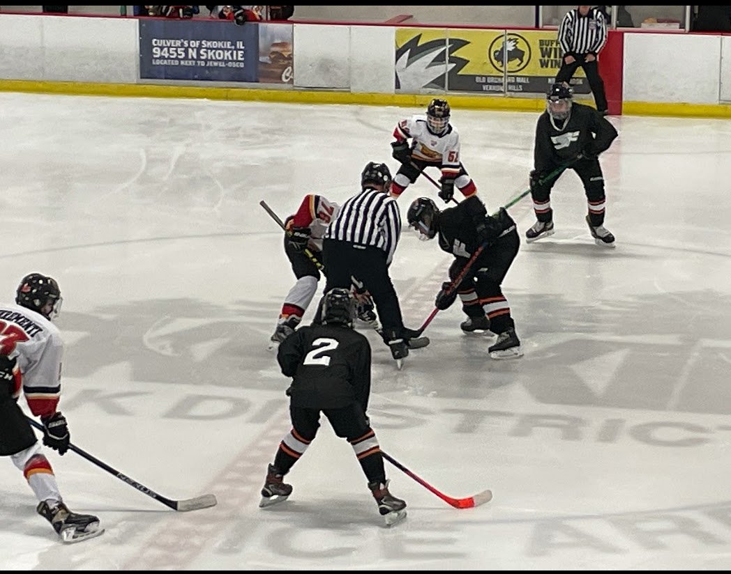 NIHL_Hockey's tweet photo. First puck drop, of the first game in the 2021-2022 Northern Illinois Hockey League season. The Skokie and the Express, PeeWee Gold teams kicked off the season for us. We wish all the teams in the league an exciting year! Hockey's back baby! https://t.co/3dzVMbSexi