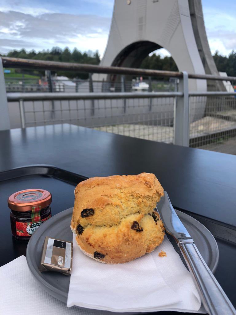 SSconesociety's tweet photo. Falkirk Wheel. After a visually appealing start, Scone maybe wasn’t in ‘the premier league’ but some extra butter and jam is worth asking for. Quite filling after a long cycle along the canal which was welcome. Enjoy the day out and location. #scottishsconesociety #scones #jam https://t.co/FBx1F7ajpg
