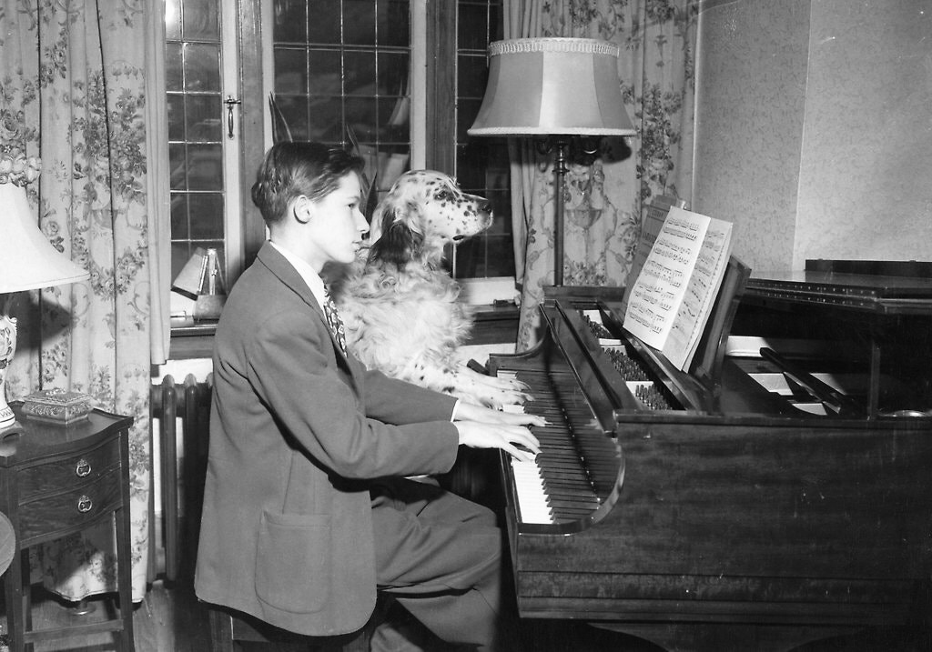 Glenn Gould playing with his dog
age 16