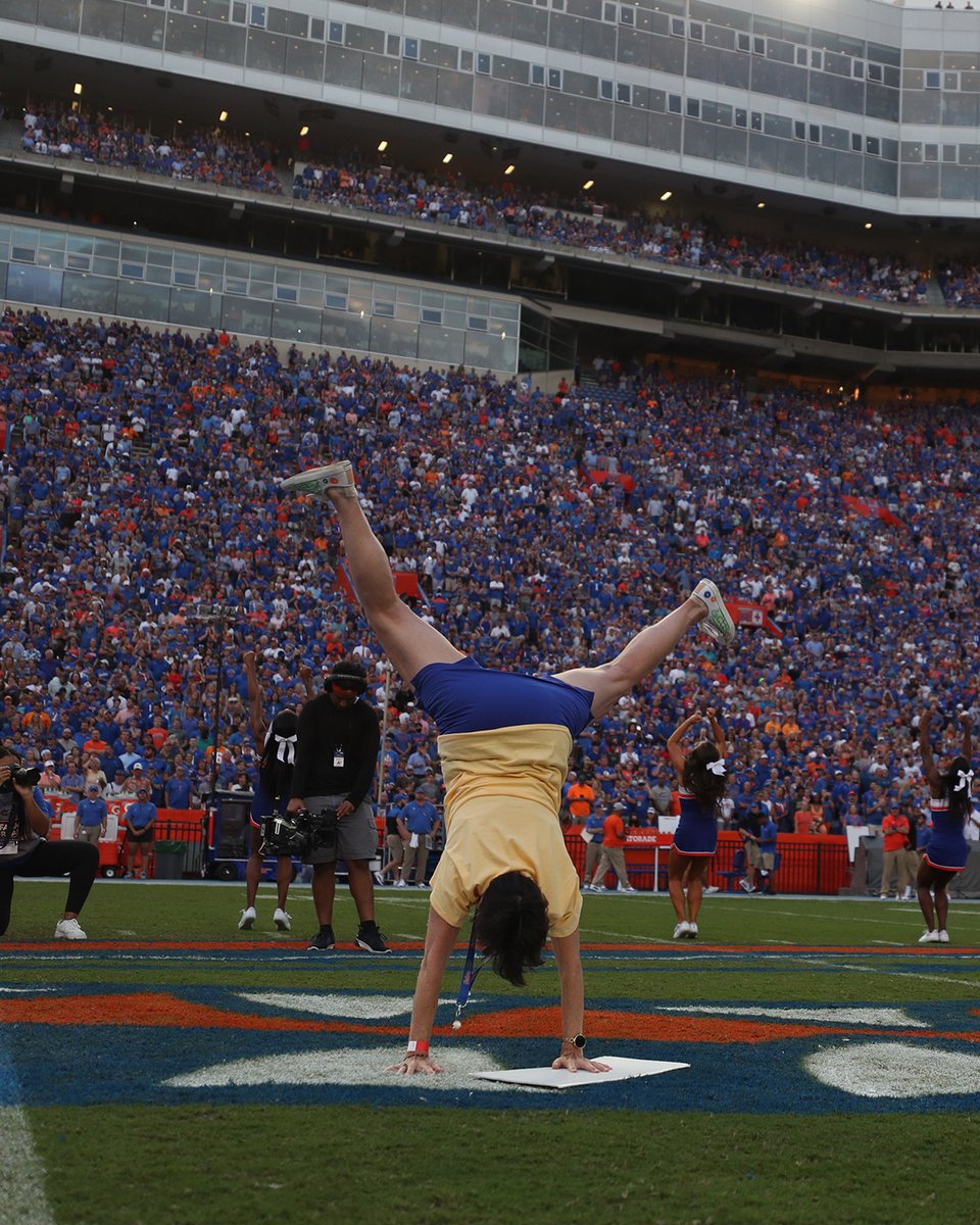 FloridaGators's tweet photo. Honorary Ms. Two-Bits tonight are from the first three women's teams at University of Florida as we celebrate 50 years of women's sports here. 

They are Sue Halfacre (swimming), Cherrietta Prince (track &amp; field) and Nancy Thayer (gymnastics) 

*yes a cartwheel was performed* https://t.co/vstxW2i3pH
