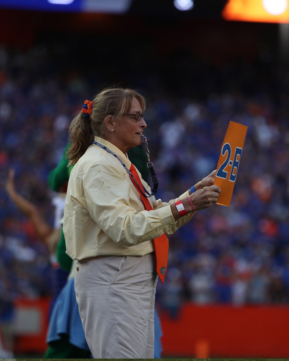 FloridaGators's tweet photo. Honorary Ms. Two-Bits tonight are from the first three women's teams at University of Florida as we celebrate 50 years of women's sports here. 

They are Sue Halfacre (swimming), Cherrietta Prince (track &amp; field) and Nancy Thayer (gymnastics) 

*yes a cartwheel was performed* https://t.co/vstxW2i3pH