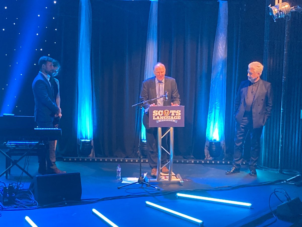 LesleyRiddoch's tweet photo. Special award Janet Paisley Services to Scots won by Derrick McLure at Scots Language Awards. #SCOTSLA ⁦@handsupfortrad⁩ https://t.co/7WNfr88c5i