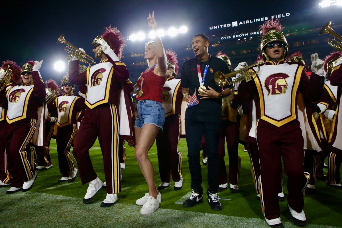USC_Athletics's tweet photo. So proud to honor our Tokyo Olympians at tonight’s @USC_FB game! #FightOn 🥇 https://t.co/ytSxHIAcPF