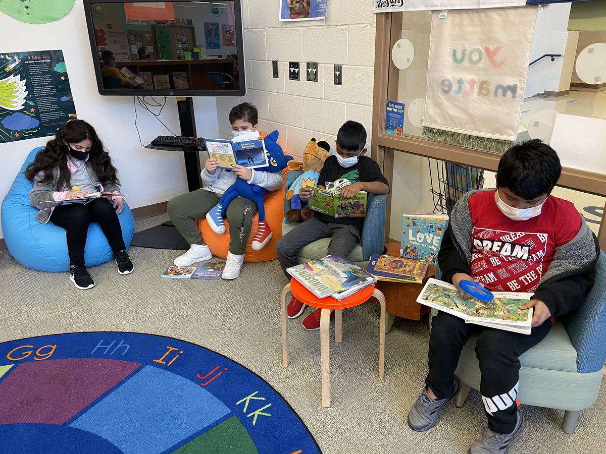NESlibrary's tweet photo. We LOVE working with our @chccs @NorthsideES @NESnewcomers students! The library is a special place on any day but when these students walk through the doors it makes it even better. No better way to spend a Friday than getting books into their hands. #StoryJOY #NorthsideREADS https://t.co/gTEyPgRnJW