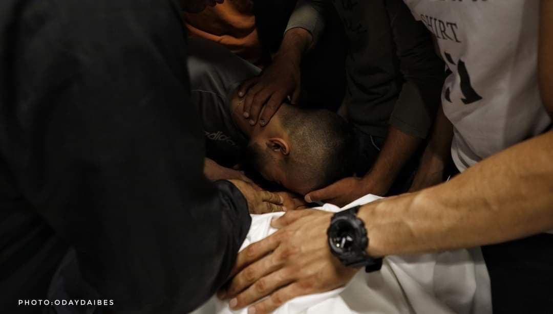 ESafadpal's tweet photo. Photos | Family members and friends bidding a farewell to martyr Osama Soboh, who was shot dead by IOF soldiers during a raid of Burqin village in the occupied West Bank early today morning. https://t.co/LkGYmomkb7