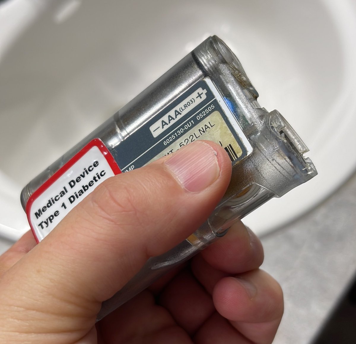 shanselman's tweet image. My trusty insulin pump of over 15 years finally died. Wasn’t dropped. Just slowly rotted and cracked and disintegrated until today a major piece fell off. 🥲 #diabetes #t1d #openaps #LoopCommunity