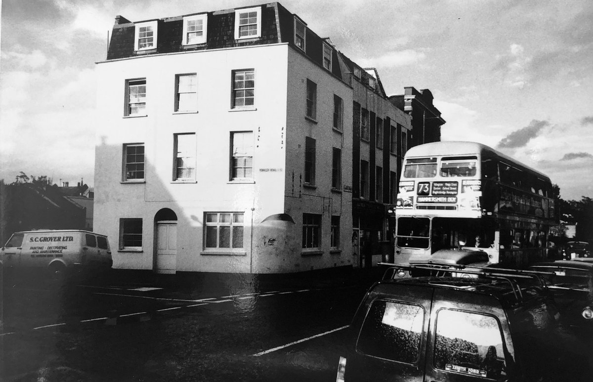 HistoryOfStokey's tweet photo. Stoke Newington Church St c. 1985. Photo by Martin Bailey. The 73 heading to Hammersmith. The building on the corner is early 19th century and windows on the left are a later extension. Used to be a shop on the ground floor. It was part of a row of similar houses in Yoakley Rd https://t.co/OrVSoM7Ql0