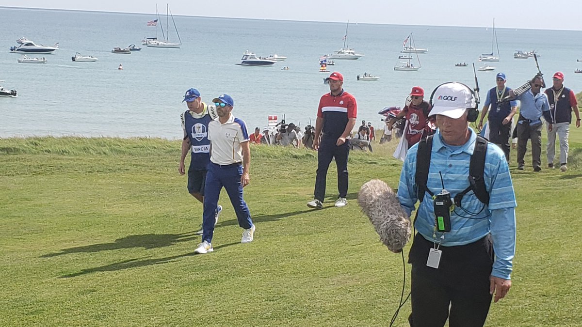 Bryson DeChambeau and Sergio Garcia walk the fairway nearing halfway mark of #RyderCup2020. https://t.co/F2rw4bB0SF