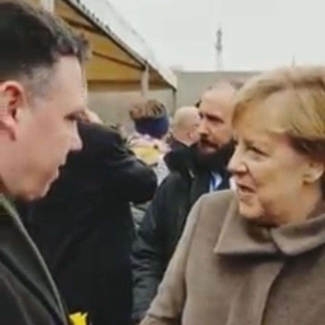 PaulMcauliffe's tweet photo. Whatever your view of #AngelaMerkel it's right that today people acknowledge almost 17 years of public service leading a European nation. This photo of her at the G7 with Trump is one I won't forget along with the opportunities I had to chat with her at #mauerfall30 https://t.co/uyen32goRN