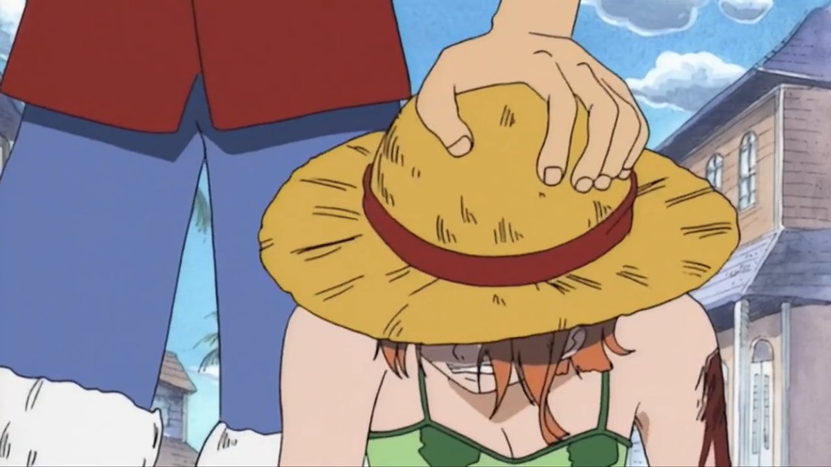 Luffys hat is his greatest treasure and so to entrust Nami with it means no...