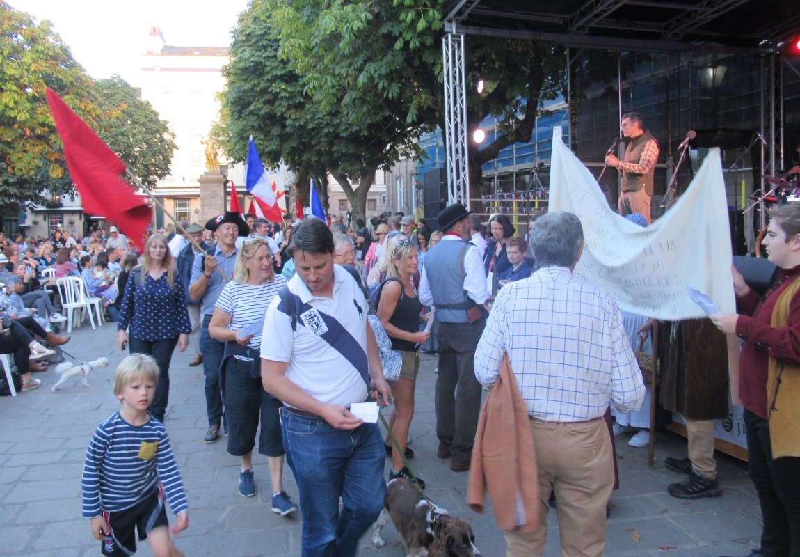 GeraintJennings's tweet photo. #CornRiotsJSY reenactment march arrived in the Royal Square https://t.co/j6A7jGuVxU