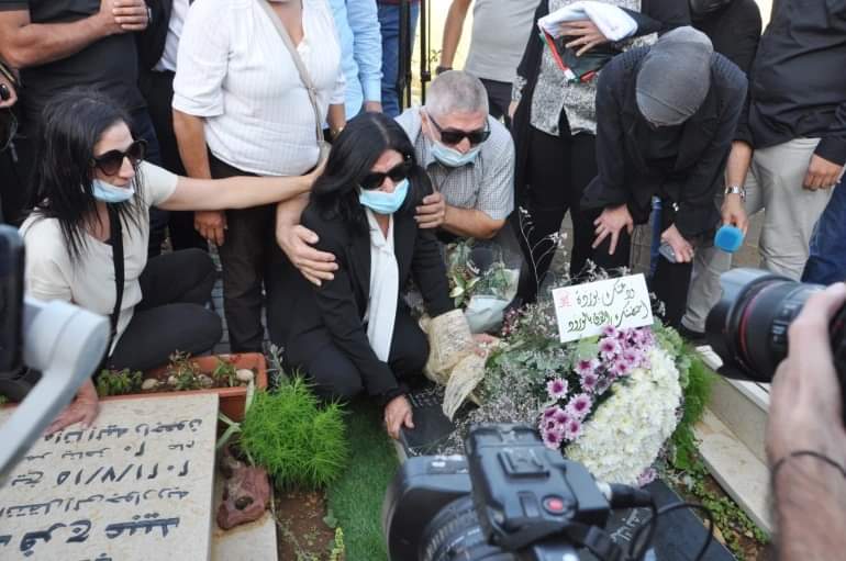 ipsc48's tweet photo. Palestinian parliamentarian Khalida Jarrar released from Israeli prison where was held for 2 years in administrative detention 
The first place she went was to the grave of her daughter Suha, who died this year with her mother prevented from seeing her or attending her funeral https://t.co/IPrMKGR4Vk