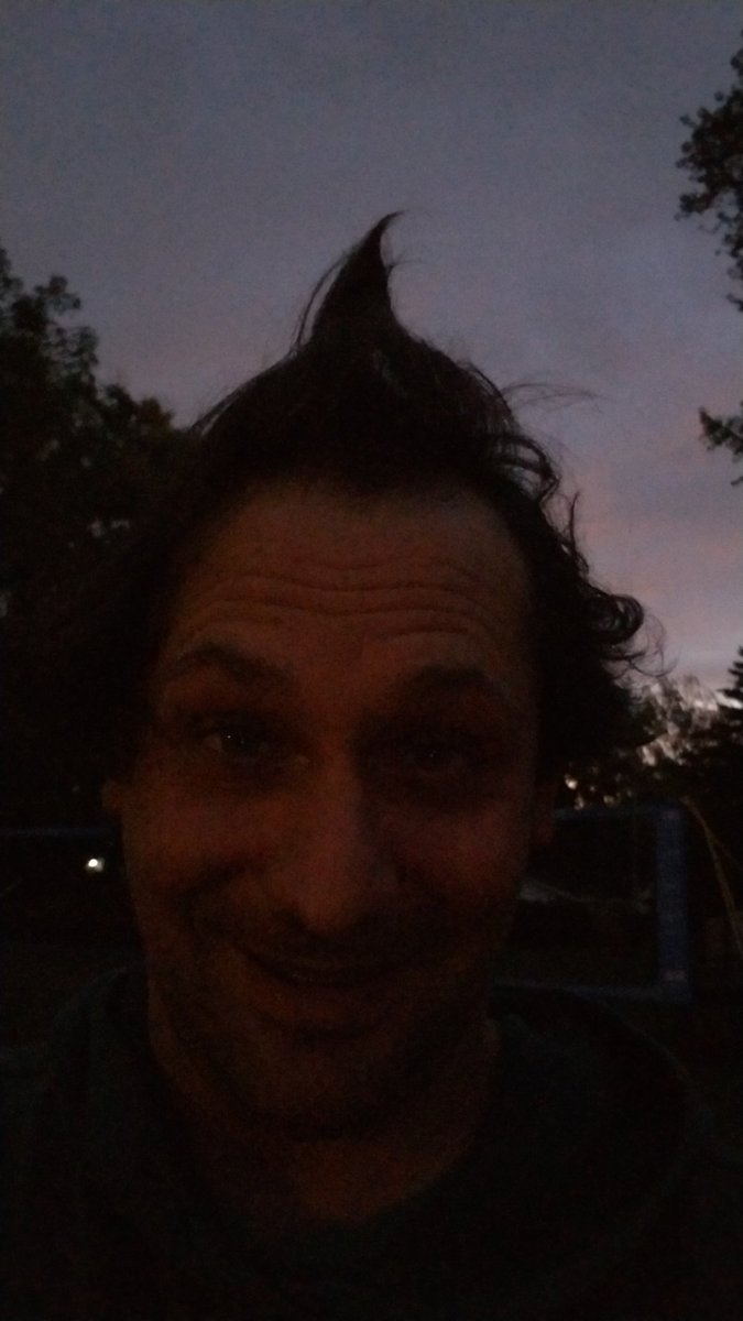 chuckrobins's tweet photo. @smrobinsn Is it weird instill have the same haircut?? I just dont want to cut what's left up there.... and I lost the troll doll. #wisconsinsunset https://t.co/EEol7Ebiu2