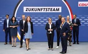 woopnik's tweet photo. #LaschetRacist Laschet is such a racist. He even had a black person on his team. Why, why, why? #Inclusivity? He just put a black person his team to win the election. That’s #racism. Serves him right that he lost the #Bundestagswahl2021 #Bundestagswahl21 #bundeswahl https://t.co/erjwVBUKcu