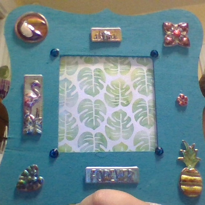 LibraryLadyUGL's tweet photo. More Art by Tom.  An autism mom in Michigan is doing a fundraiser to create a "village" for autistic adults and their families to live together.  We're donating Tom's artwork to support this venture. He's been so happy painting and decorating these picture frames. https://t.co/IVuL8JzSNw
