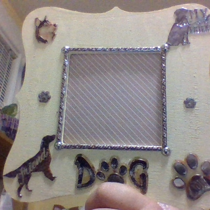 More Art by Tom.  An autism mom in Michigan is doing a fundraiser to create a "village" for autistic adults and their families to live together.  We're donating Tom's artwork to support this venture. He's been so happy painting and decorating these picture frames.