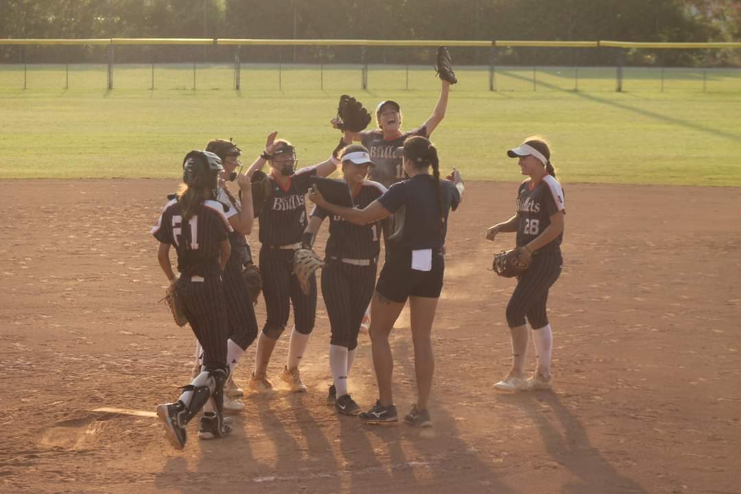 EC05Bilz's tweet photo. Thank you @julie_baldwin13 for capturing this moment. 
@LuluCastelo1 and the EC girls on the field celebrating her 1,000 put out in 4 years. So fitting to happen in OKC.
🧡💙 You Lu and I am so incredibly proud of the athlete and person you have become. 
@EastCobbBullets https://t.co/kPcRA6R1pT