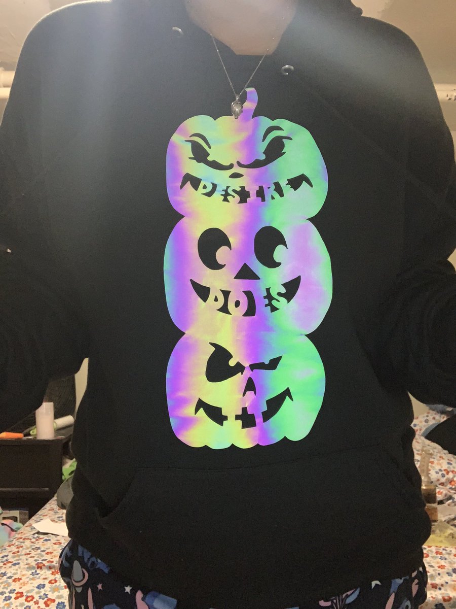 desiredoesit's tweet photo. Spooky time! Hoodie now available! Can also customize with your business name in the mouth instead of mine! #spookyseason #jackolantern #hoodie #reflectivevinyl #rainbowreflect #flash #noflash #desiredoesit https://t.co/4fiR4bOTlX