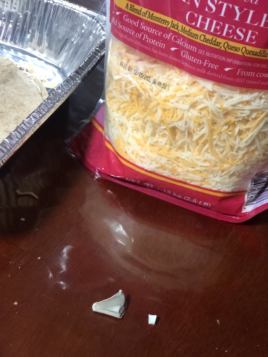 VictoriaSati's tweet photo. @costco I’m fuming!! Why did I just find this in my cheese?!? Trying to kill me … smh. I demand answers https://t.co/45ICwjApLH