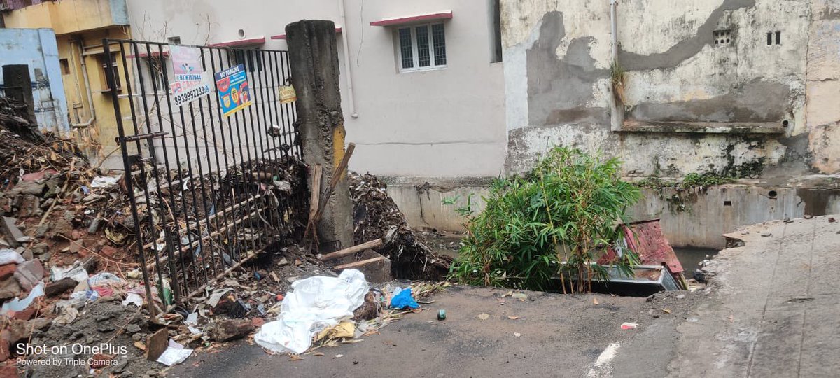 srithi22's tweet photo. The canal near Athreyapuram 2nd street, Choolaimedu was dredged and the debris kept near the compound wall was not cleared for 10 days. The recent rains on 21st Sep made the wall to collapse posing a serious danger. @chennaicorp Kindly take immediate action to avoid accidents. https://t.co/RgI1SCIkTu