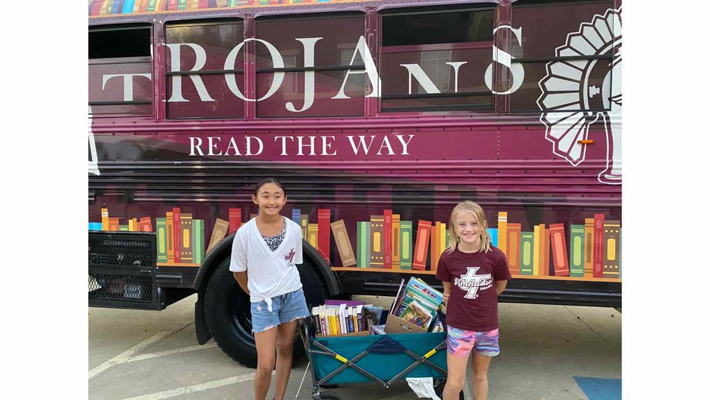 JenksReadtheWay's tweet photo. A huge thank you to Jenks Gymnastics for the books they donated to #TrojansReadTheWay at the Hometown Huddle! We could not do this without all the community support and involvement - we appreciate you! https://t.co/pO9n8veBDC