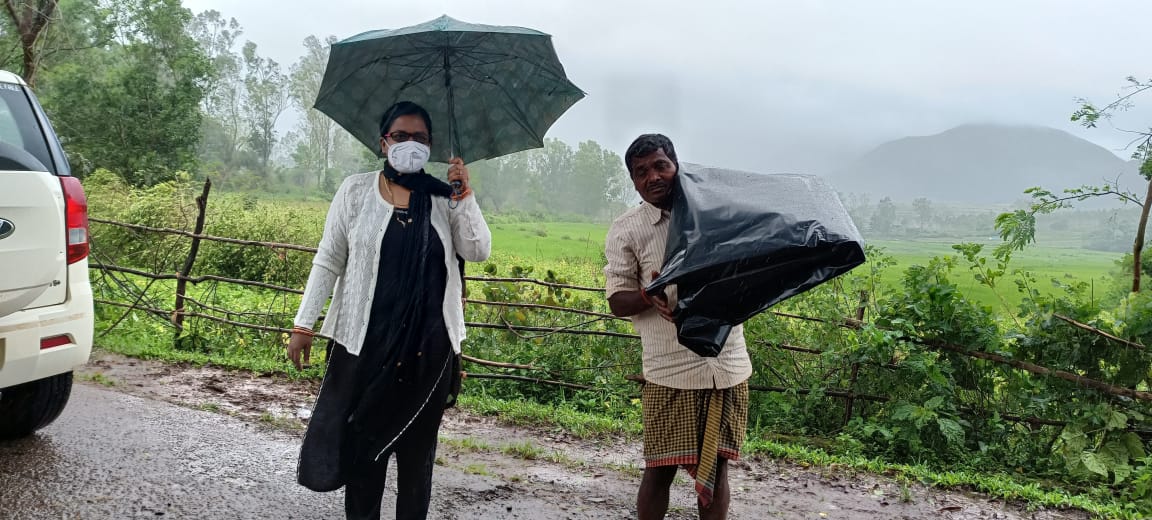 Distribution of polythene by Tahsildar Semliguda to "Gulab"cyclone affected families in Semliguda Tahsil.