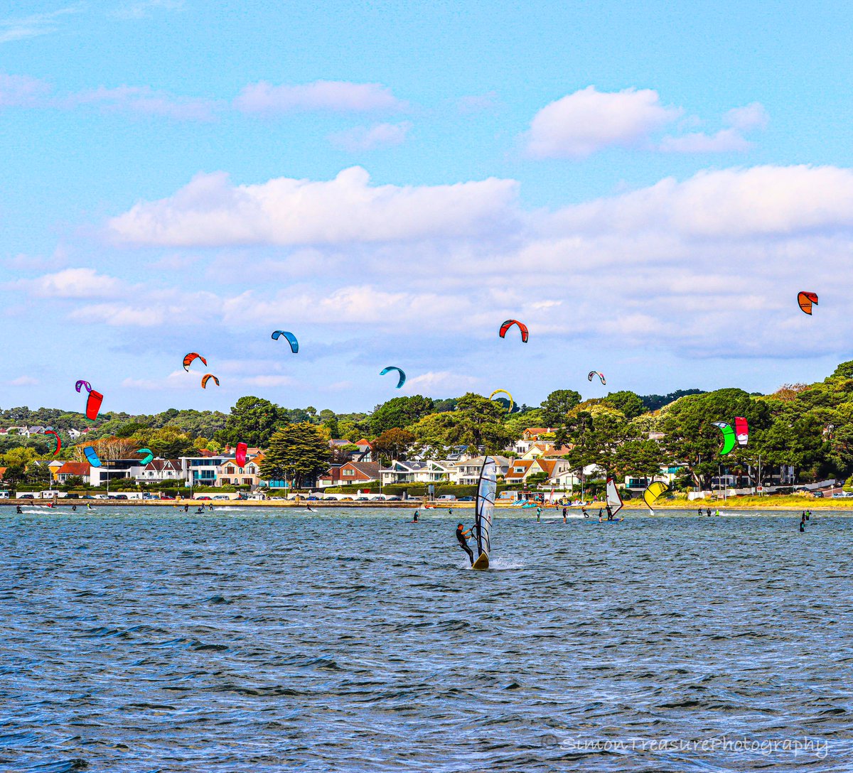 Simon_Treasure's tweet photo. Yesterday at Holes Bay and sandbanks, Poole Dorset. The wooden boat is called Flapper #holesbay #sandbanks #twinsailsbridge #boats #seacape #landscape #poole #sailboarding #kitesurfing #sea #sailing #dorset #canon #canonphotography https://t.co/n0T7BfXlfc
