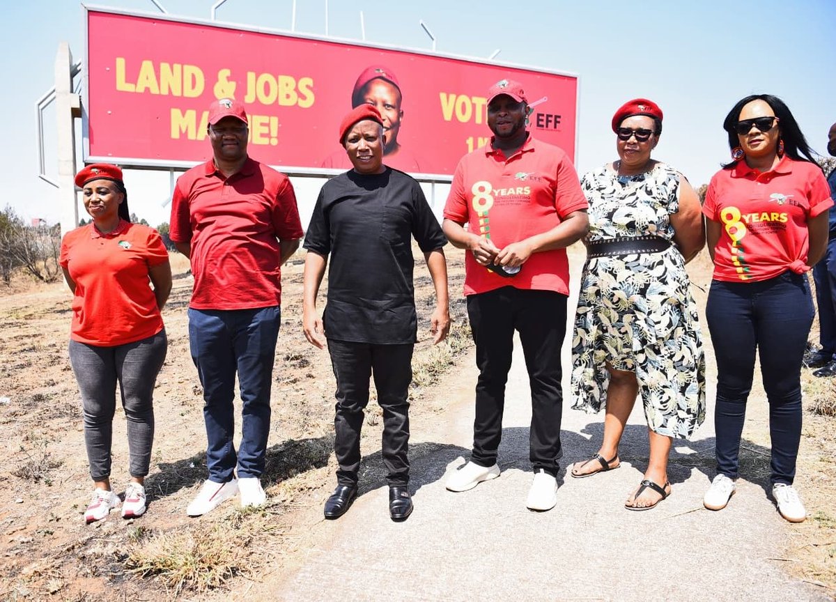 EFFSouthAfrica's tweet photo. EFF leadership at the unveiling of the EFF billboard at OR Tambo today. #LandAndJobsManje #VoteEFF https://t.co/J5b04hx5XY