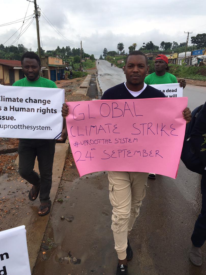 Greenpeaceafric's tweet photo. This weekend, across the African continent, the youth UNITED to save our planet. These #ClimateStrike youth leaders are courage in action ✊✊. 

#UprootTheSystem

.@BahandagiraD 
.@Riseupmovt 
.@gabriel_klaasen https://t.co/AJdxgv0euF