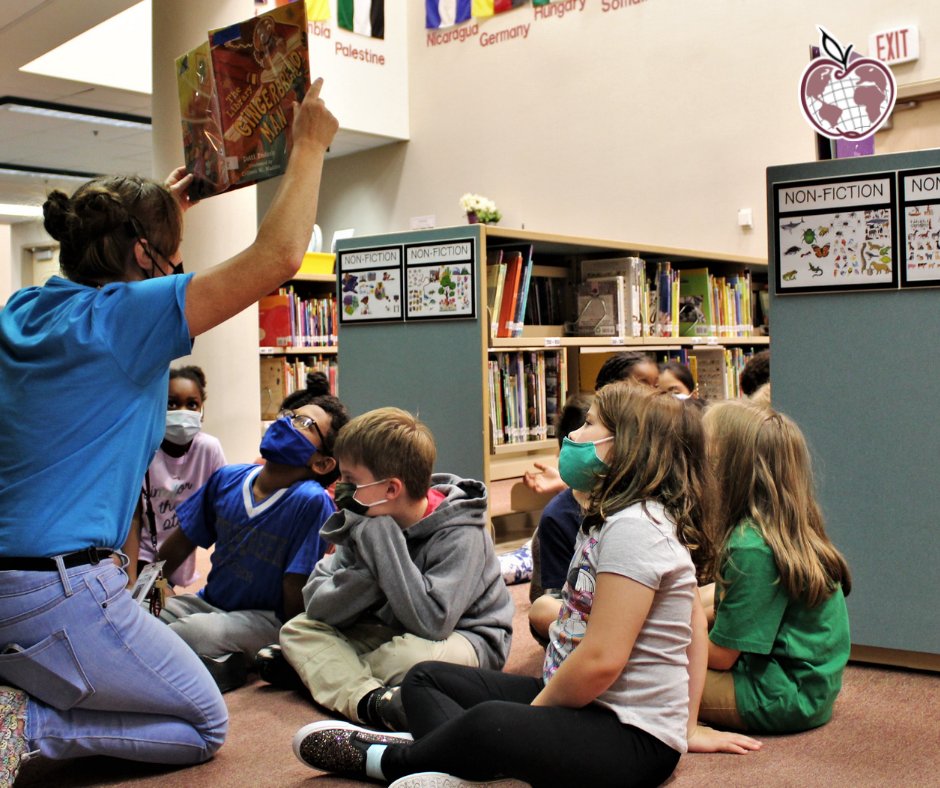 SSPPS6's tweet photo. #SSPpride first graders at Kaposia are learning about the library with the Ginger Bread Man! He takes them on a crazy adventure through the media center while learning about call numbers and where they can find their favorites subjects in the library! #SSPlearns https://t.co/Ruy4wRdthr