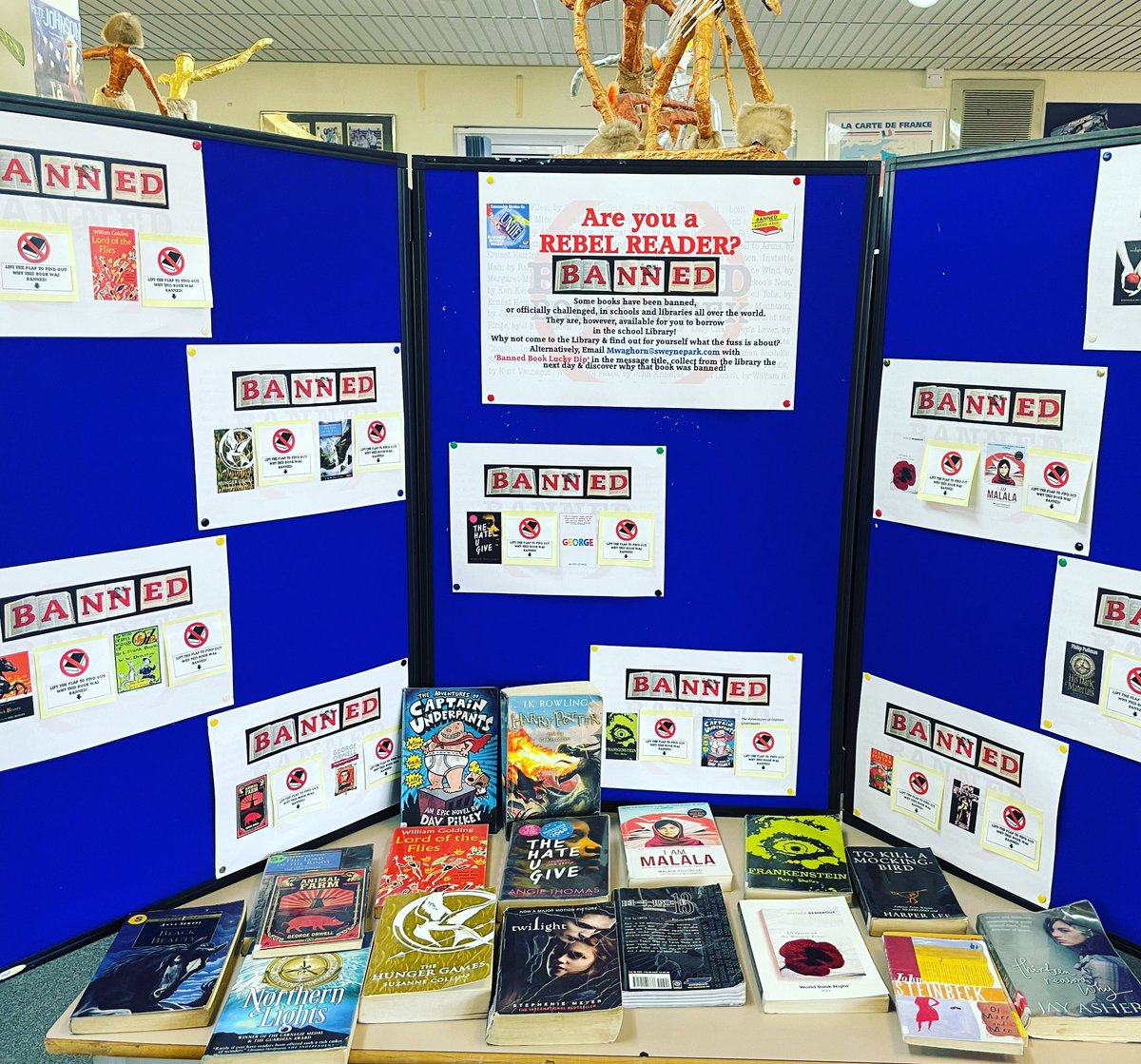 Libschool1's tweet photo. I have thoroughly enjoyed all the discussions in the library today around my #bannedbooks display.
The shock, the bewilderment, the excitement- I just love it! #BannedBooksWeek
#schoollibrary #schoollibrarian #BannedBooksWeek2021 #rebelreader https://t.co/AfqbcQBbTK