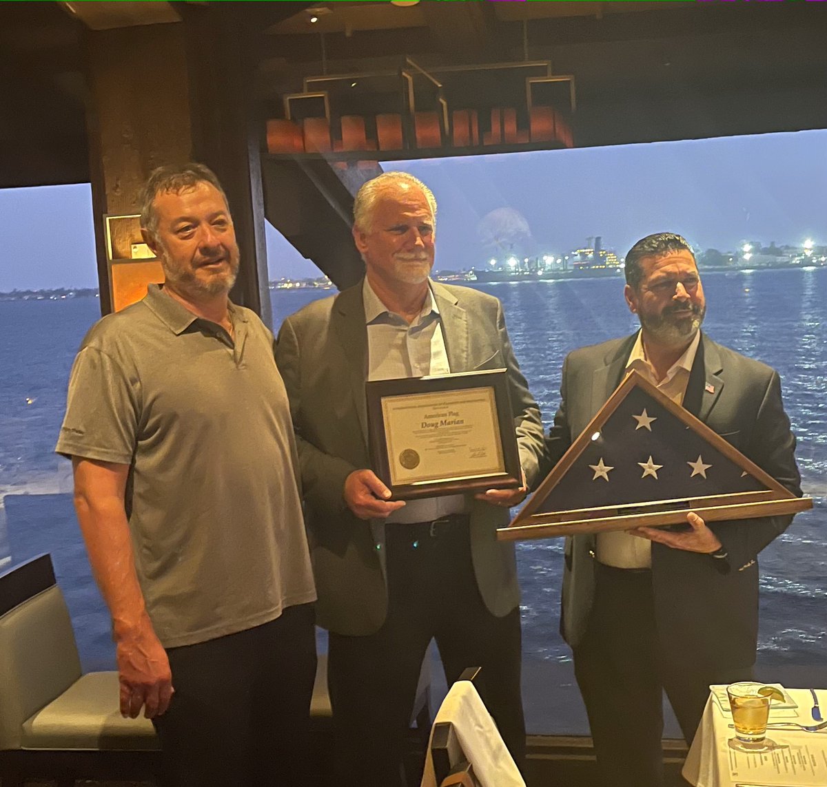 IAPMO's tweet photo. VP Steve Panelli presents Doug Marian with this year’s American Flag Award for demonstrating a commitment to our industry in both good works and lasting influence. #IAPMOconf https://t.co/CNLXM7tavj