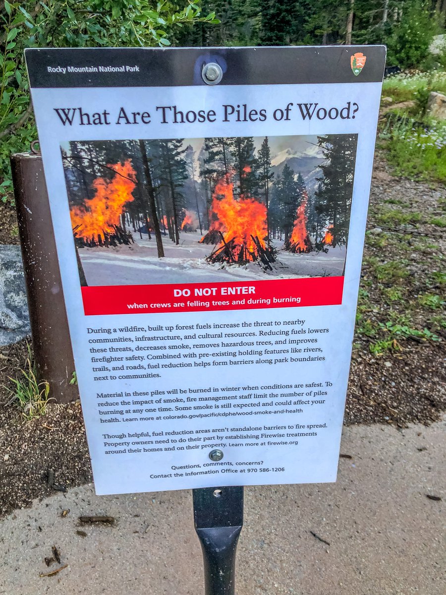 We started noticing these piles of wood in quite a few parks this summer.  
These planned 🔥  burn piles not only reduce how quickly a wildfire could spread but we also think they make the area look much better cared for.  
Such a genius idea!!!