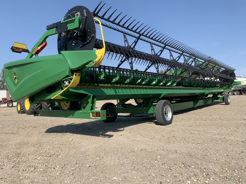 BDManufacturin1's tweet image. In response to our HT50 header transport specifically designed for the new HDR and HDX headers from John Deere, here are a few photos of the trailer in action.  Get in touch for pricing and any other details!