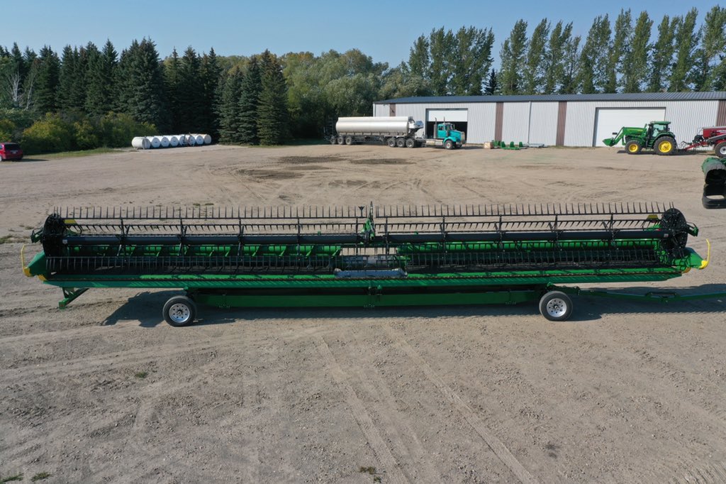 BDManufacturin1's tweet image. In response to our HT50 header transport specifically designed for the new HDR and HDX headers from John Deere, here are a few photos of the trailer in action.  Get in touch for pricing and any other details!