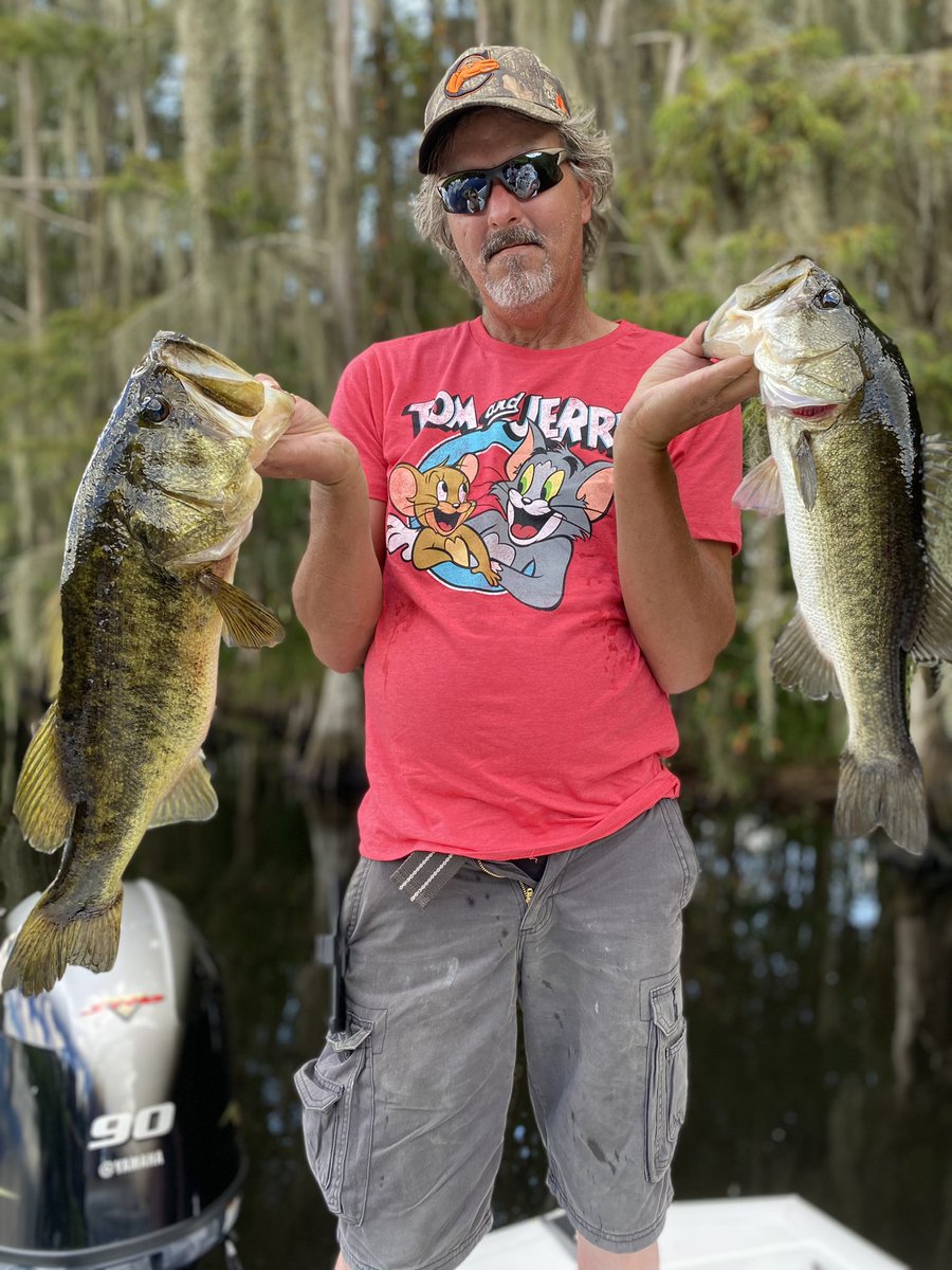 PSbassguide's tweet photo. Mike from North Carolina pulling a plastic worm through the hydrilla vegetation, Big Toho yesterday. Occasional bass chasing and chewing good till 3pm—supported by a steady three mph, north east wind. #industrialdoors #smallbiz #nc #ceo #psbassguide https://t.co/NGiqwh8NTS